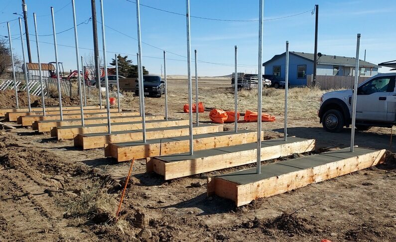 new concrete solar panel foundations array with framing